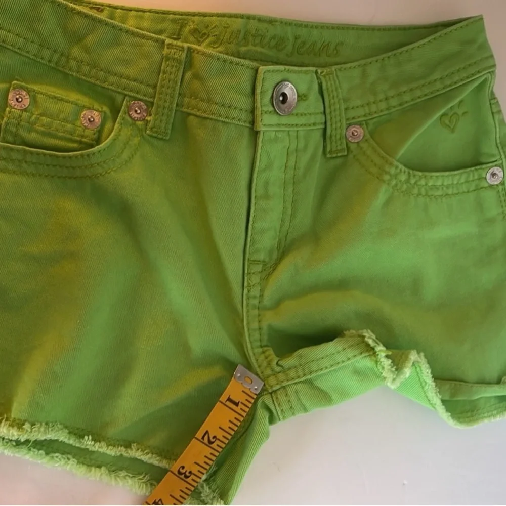 Justice lime green Jean shorts.  Simply low style  Girls size 14 S